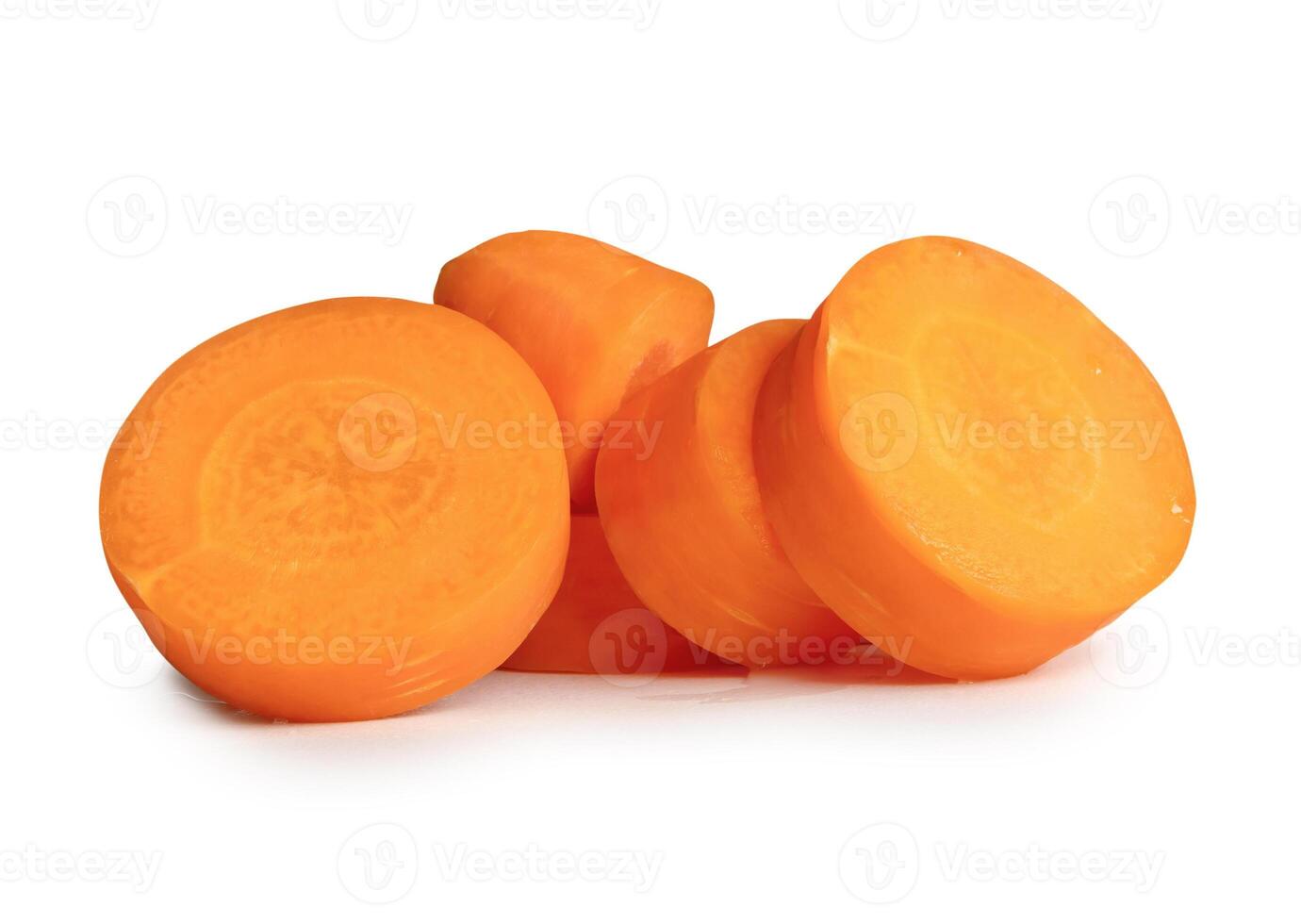 Front view of orange carrot slices or pieces in stack isolated on white background with clipping path photo