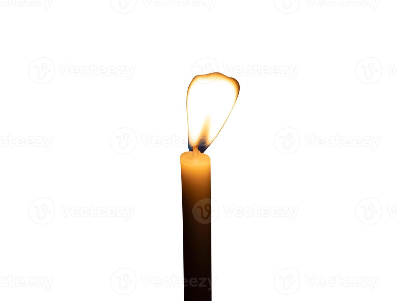 A single burning candle flame or light glowing on a small white candle isolated on white background with clipping path photo