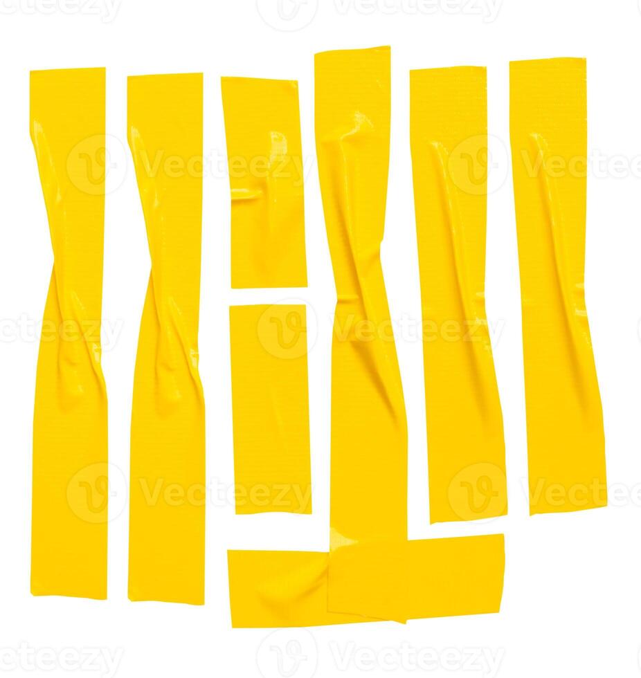 Top view set of wrinkled or crumpled yellow adhesive vinyl tape or cloth tape in stripes shape isolated on white background with clipping path photo