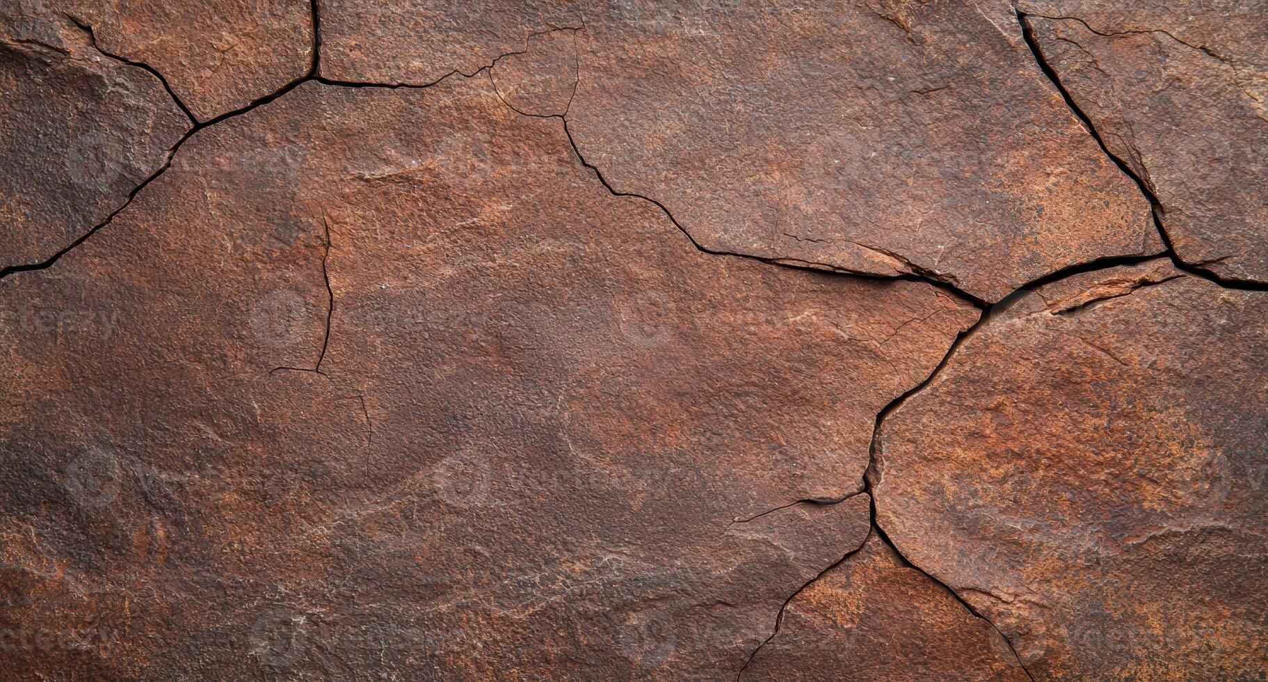 Detailed texture of cracked and weathered rock surface photo