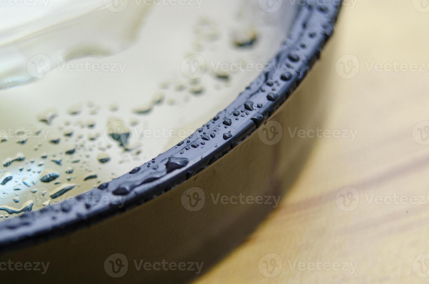 Close up of wet magnifying glass with customizable space for text or ideas photo