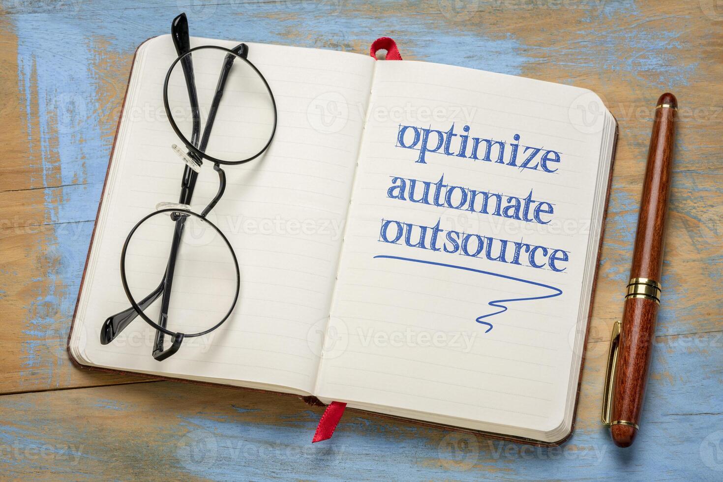 optimize, automate, outsource - business concept photo