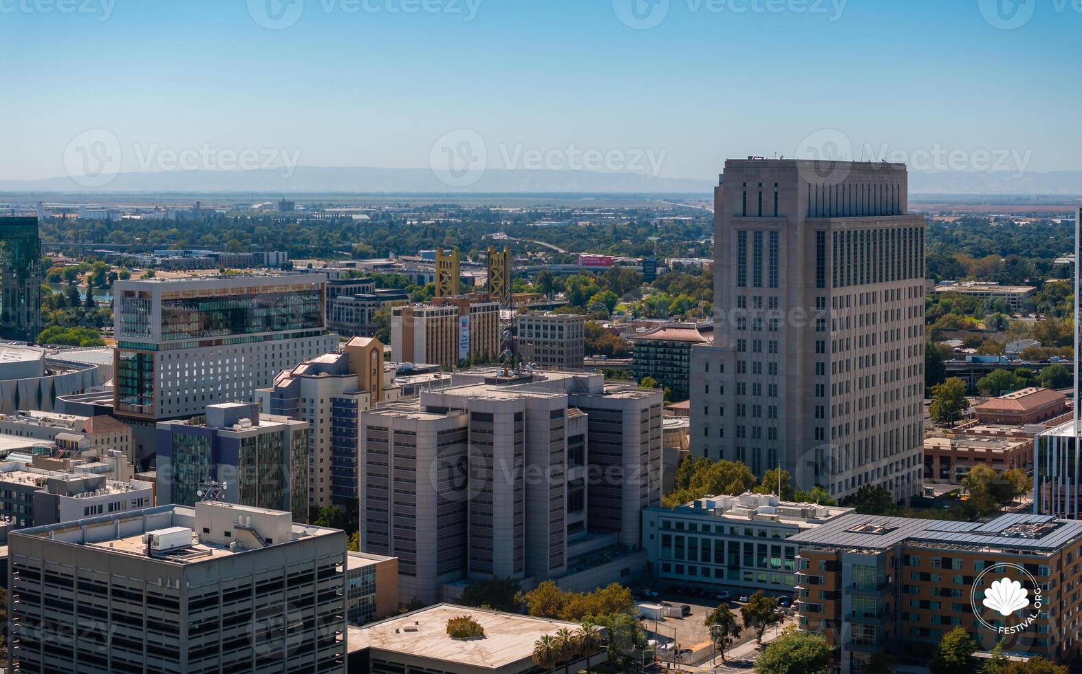 Aerial View of Sacramento Featuring Tower Bridge and Ziggurat Building photo