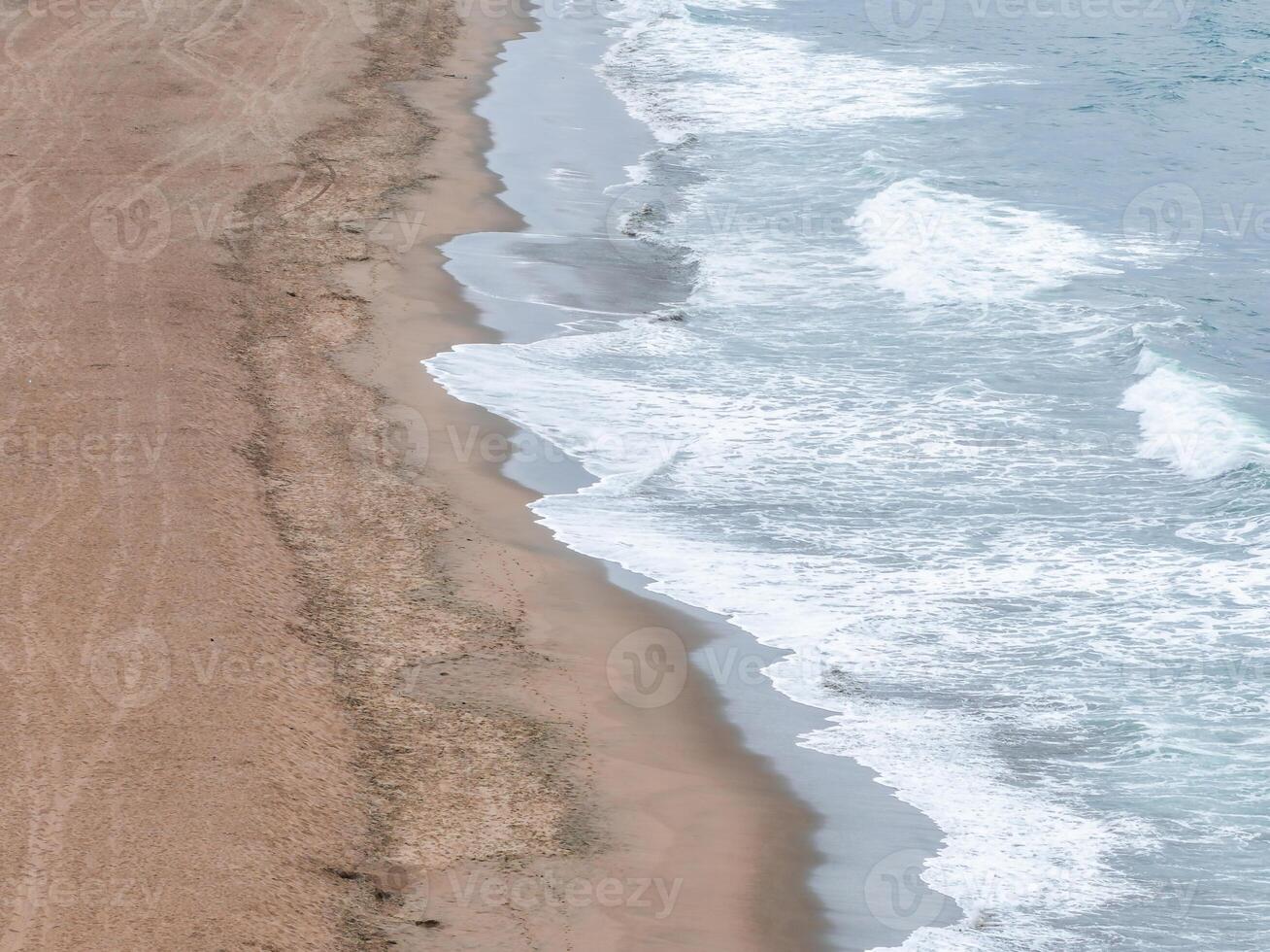 Aerial View of Serene Sandy Beach with Gentle Waves in San Francisco photo
