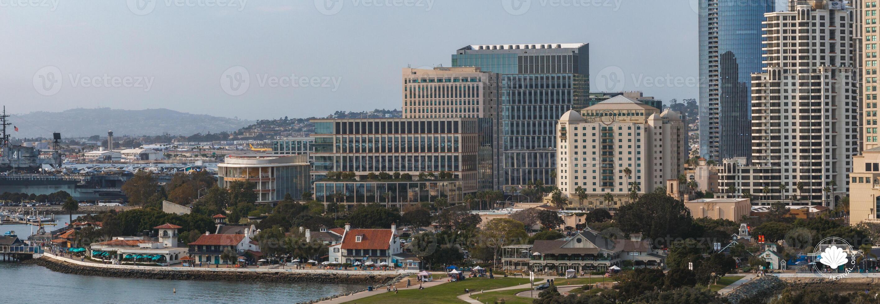 Aerial View of San Diego Skyline with USS Midway Museum and Park photo
