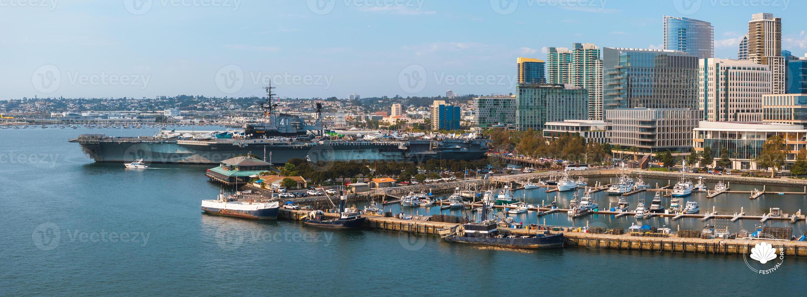 Aerial View of USS Midway Museum and San Diego Skyline photo