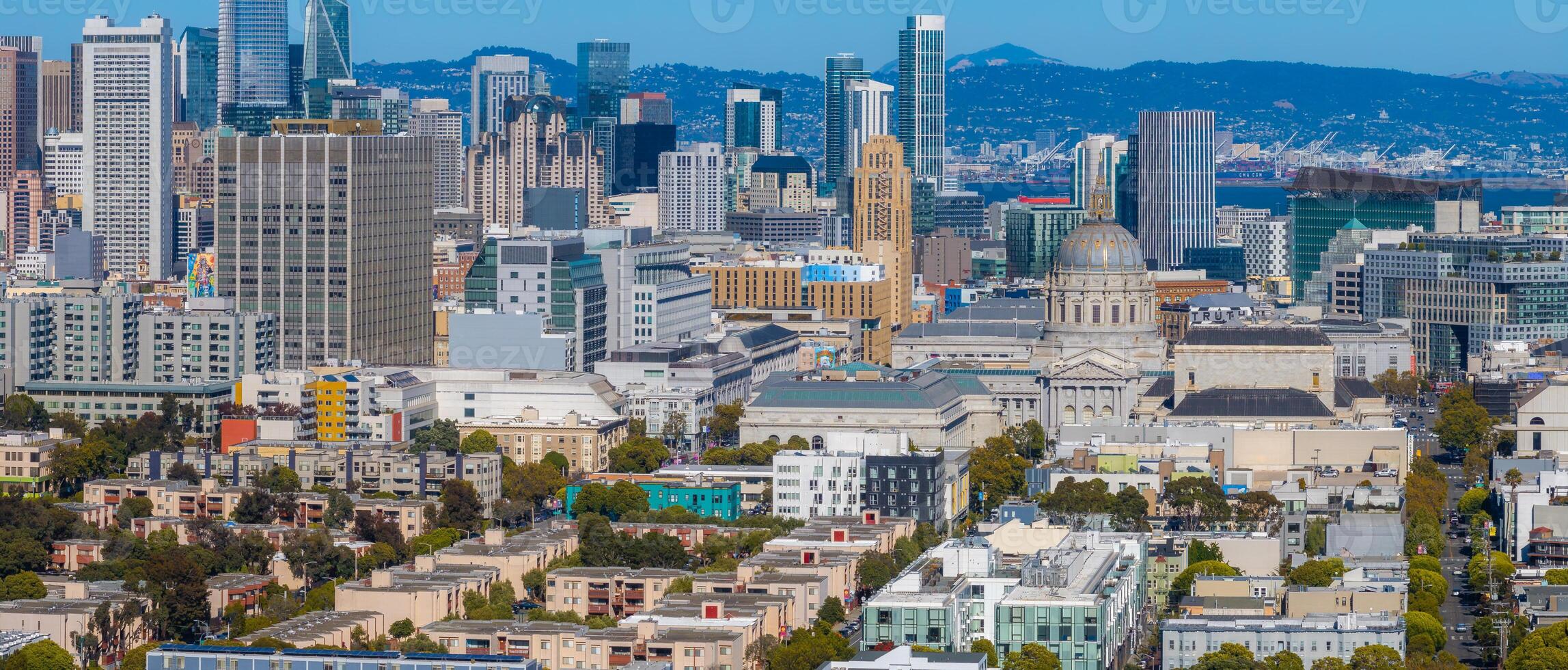 Aerial View of San Francisco City Hall and Diverse Urban Skyline photo