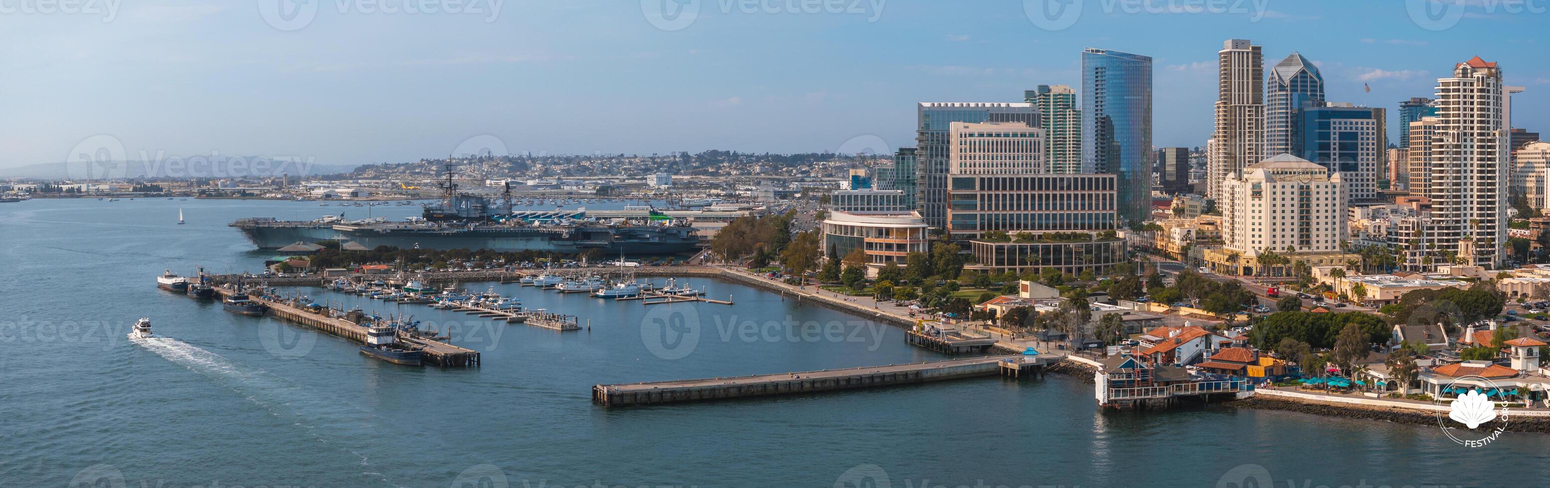 Aerial View of San Diego Harbor with USS Midway and Skyline photo