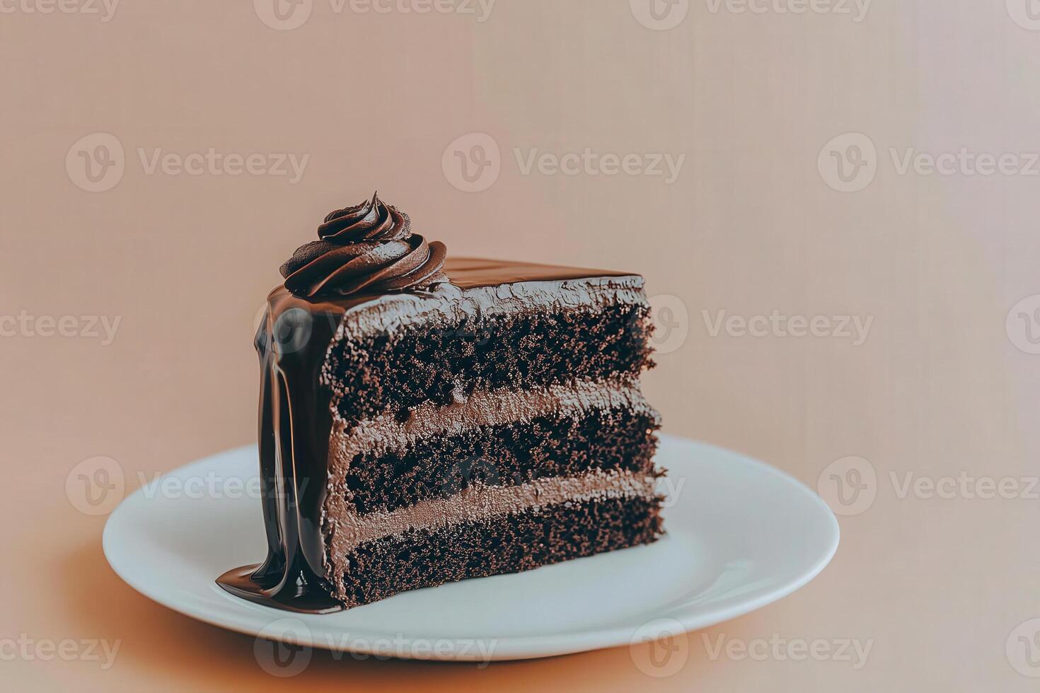 A decadent slice of chocolate cake showcases its layers filled with creamy frosting, resting elegantly on a white plate. The ganache drips invitingly, promising a rich dessert experience. photo