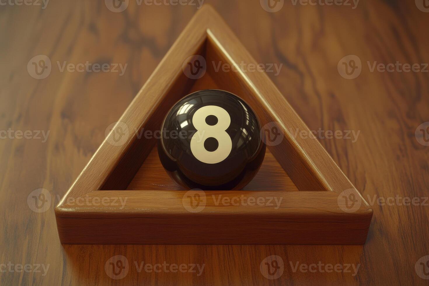 A black snooker ball marked with the number eight sits centered in a wooden triangular rack on a smooth wooden table. The setting is bright, highlighting the craftsmanship of the rack. photo