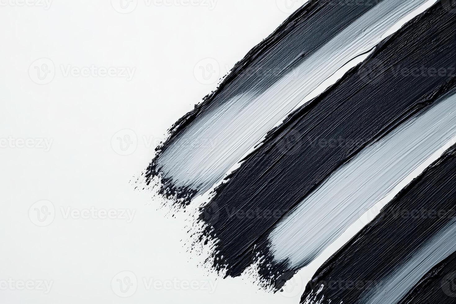 Brush strokes in bold black and delicate gray create a striking visual effect on a pristine white canvas, showcasing artistic expression and creativity in a minimalist design setting. photo