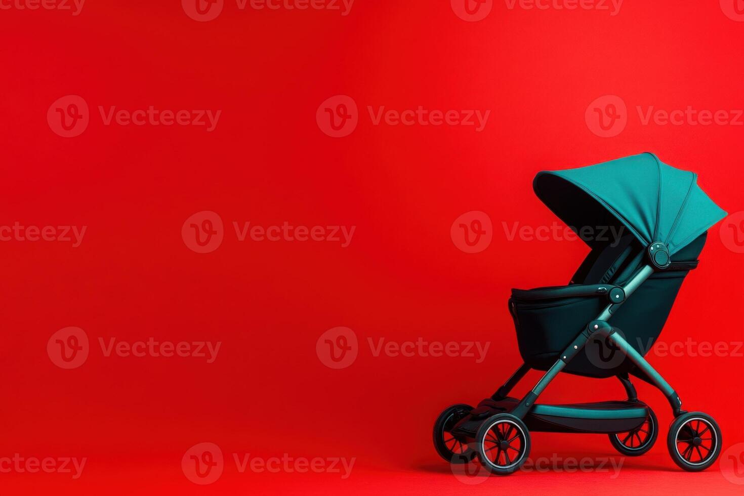 A sleek baby pram featuring a canopy stands prominently on a bright red background, showcasing its modern design. Ideal for parents seeking functionality and style for their young children. photo