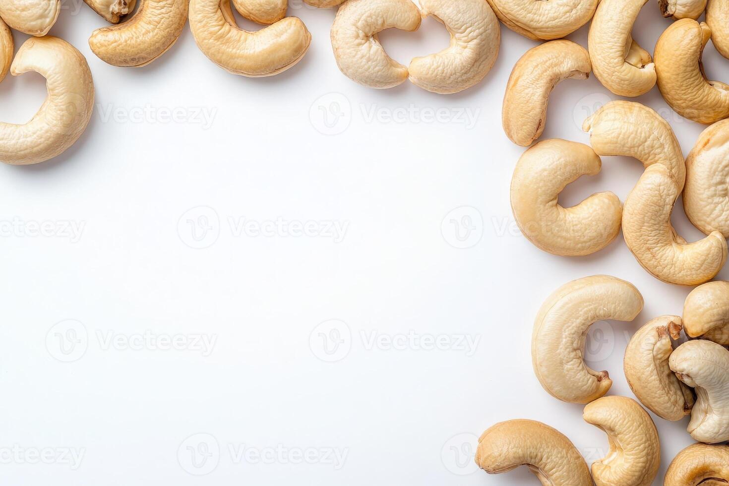 A cluster of raw cashews is artistically arranged on a minimalist white background, highlighting their unique shapes and textures, perfect for culinary or health-related projects. photo
