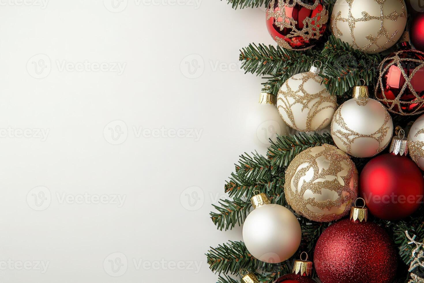 Vibrant Christmas tree ornaments in red, gold, and white are nestled among evergreen branches, creating a festive atmosphere perfect for holiday celebrations and seasonal decor. photo