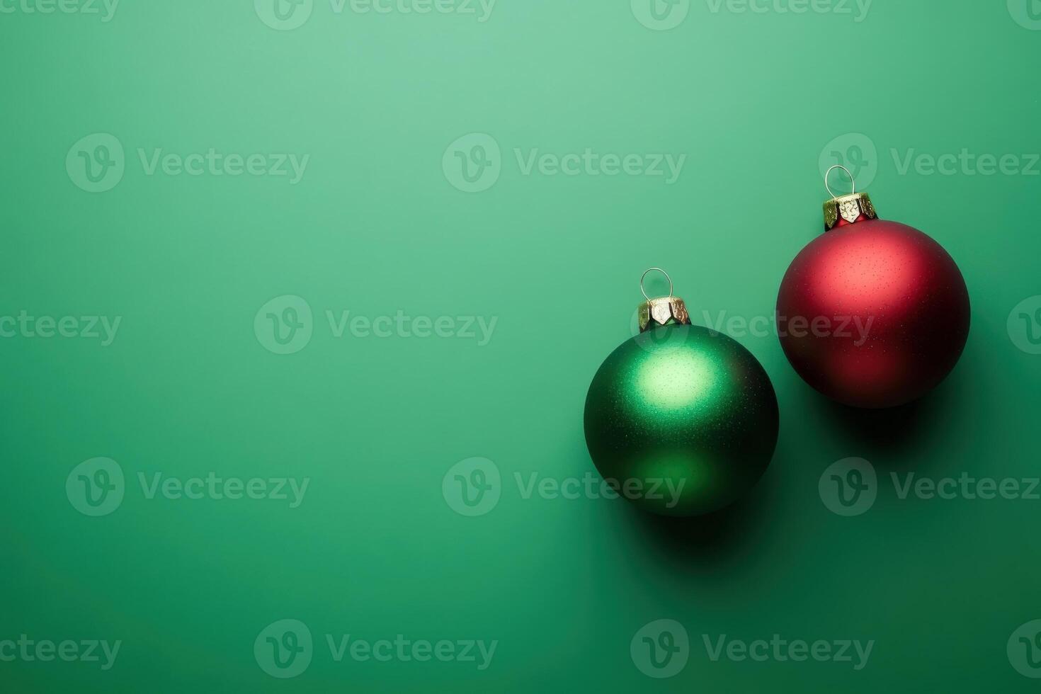 Two vibrant Christmas tree ornaments, one green and one red, beautifully placed on a clean solid background, evoking a festive and cheerful holiday spirit. photo