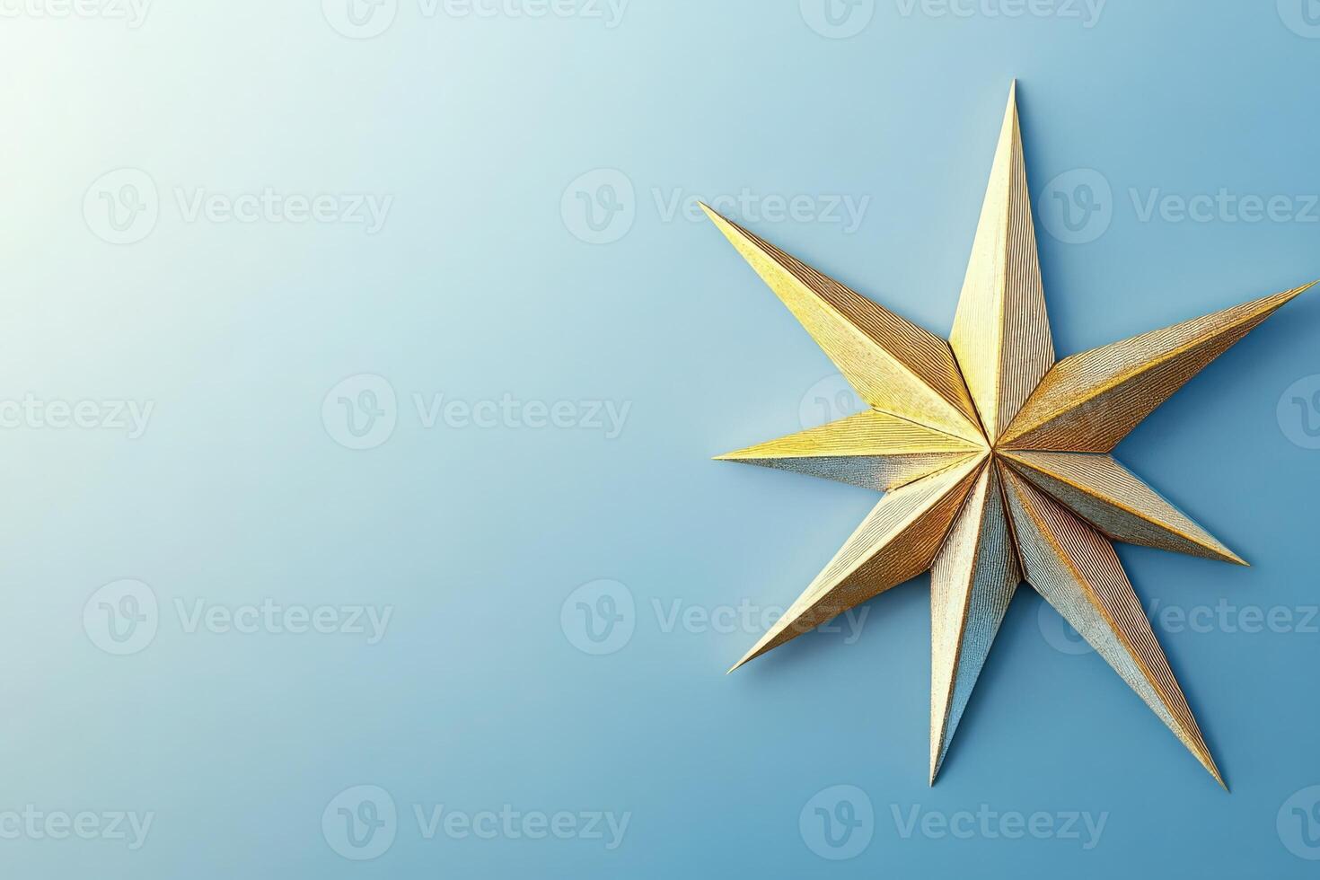 The Christmas star stands out with its intricate design, radiating warmth and joy against a calm blue background. This elegant decoration symbolizes the spirit of the holiday season. photo