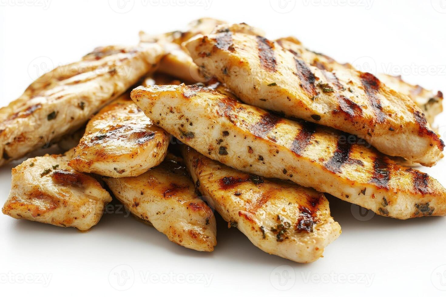 Tender grilled chicken slices are presented in the center, showcasing their golden-brown grill marks and juicy texture, making for a perfect addition to salads, sandwiches, or wraps. photo