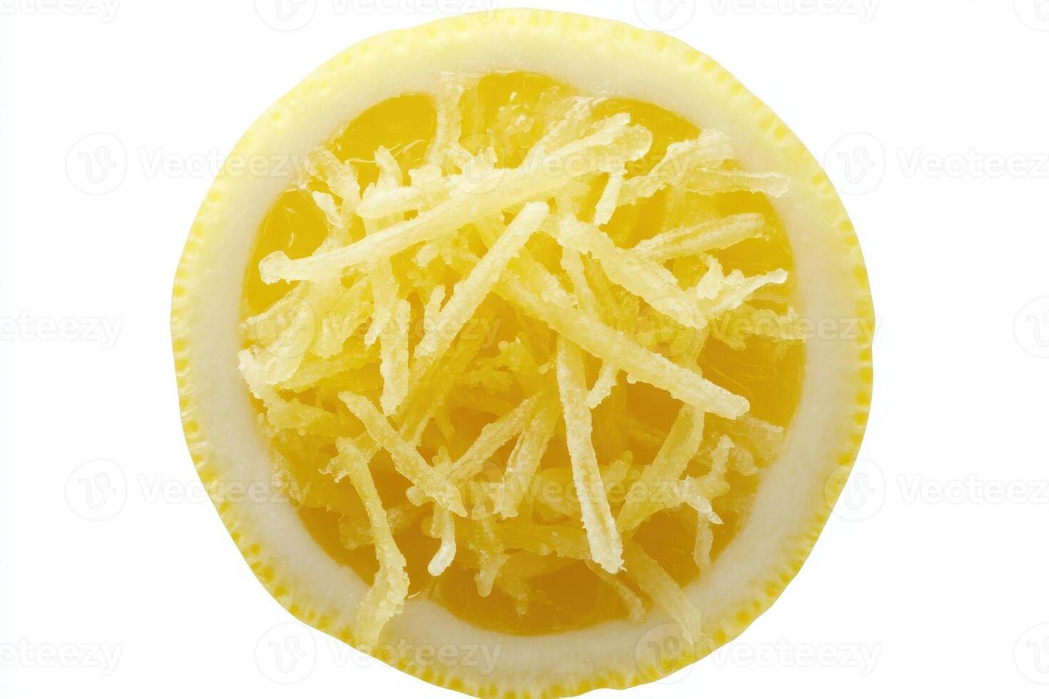 Lemon zest is displayed prominently, revealing bright yellow shavings that offer a burst of citrus aroma. The vibrant zest enhances the visual appeal and invites culinary inspiration. photo