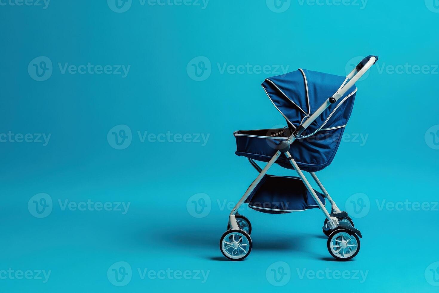 The ergonomic baby trolley is positioned against a bright blue solid backdrop, showcasing its sleek design and functionality, perfect for parents seeking comfort and style for their little ones. photo