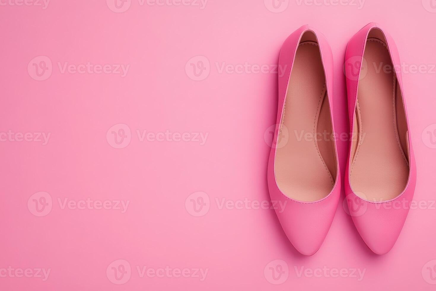 These stylish flat shoes are showcased on a vibrant pink background, highlighting their elegant design. Ideal for both casual outings and more formal occasions, they blend comfort with fashion. photo