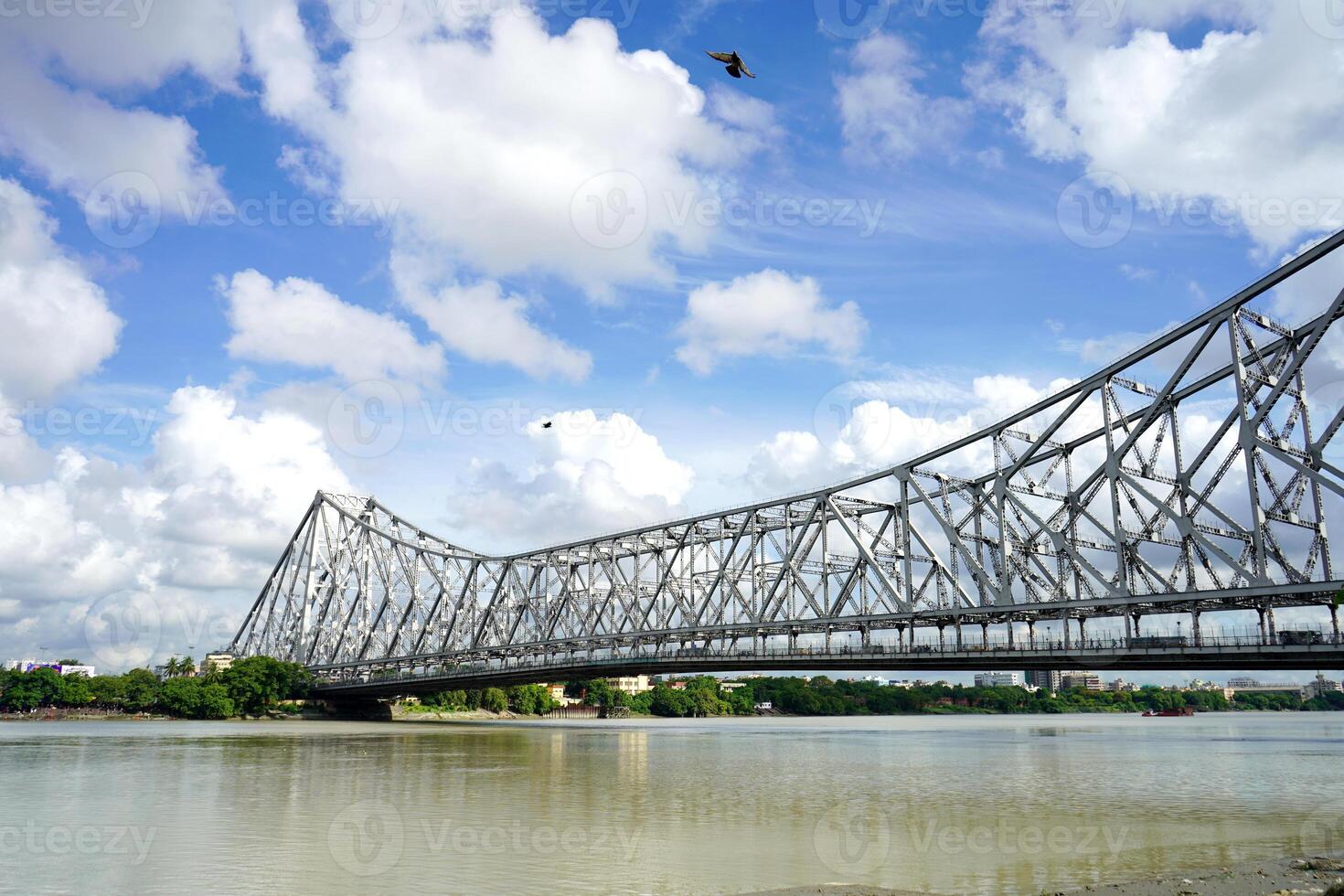 A View of Howrah bridge and Holy Ganga River from Mullick Ghat photo