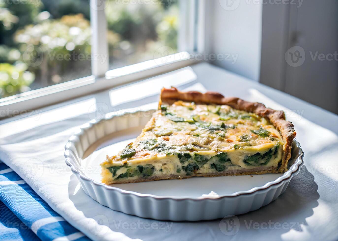 Side-shot of a slice of quiche being lifted from the whole, golden crust and creamy filling in focus, with natural light streaming through a window photo
