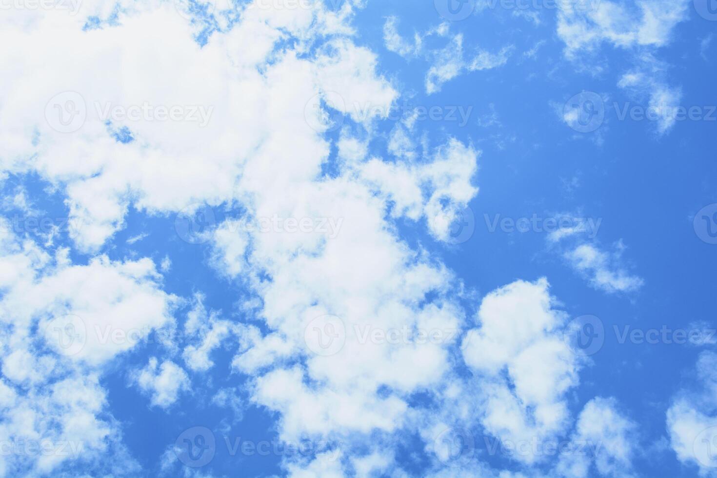 A blue sky with white clouds photo