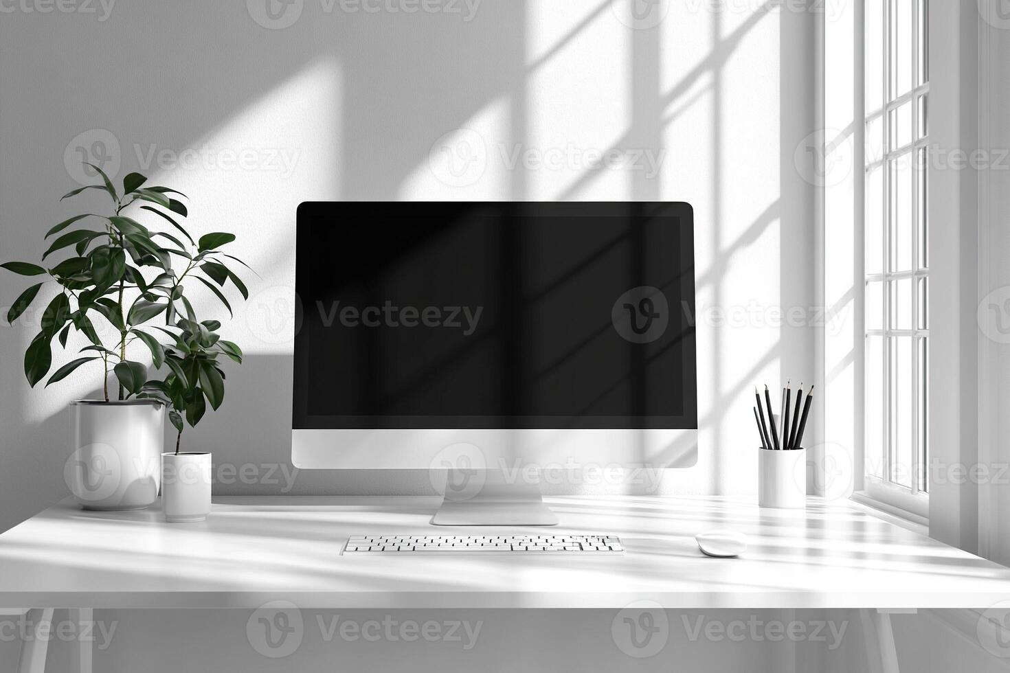 Minimalistic interior of a white office or home desktop with a black monitor, keyboard and mouse. Green potted plants next to the computer. photo