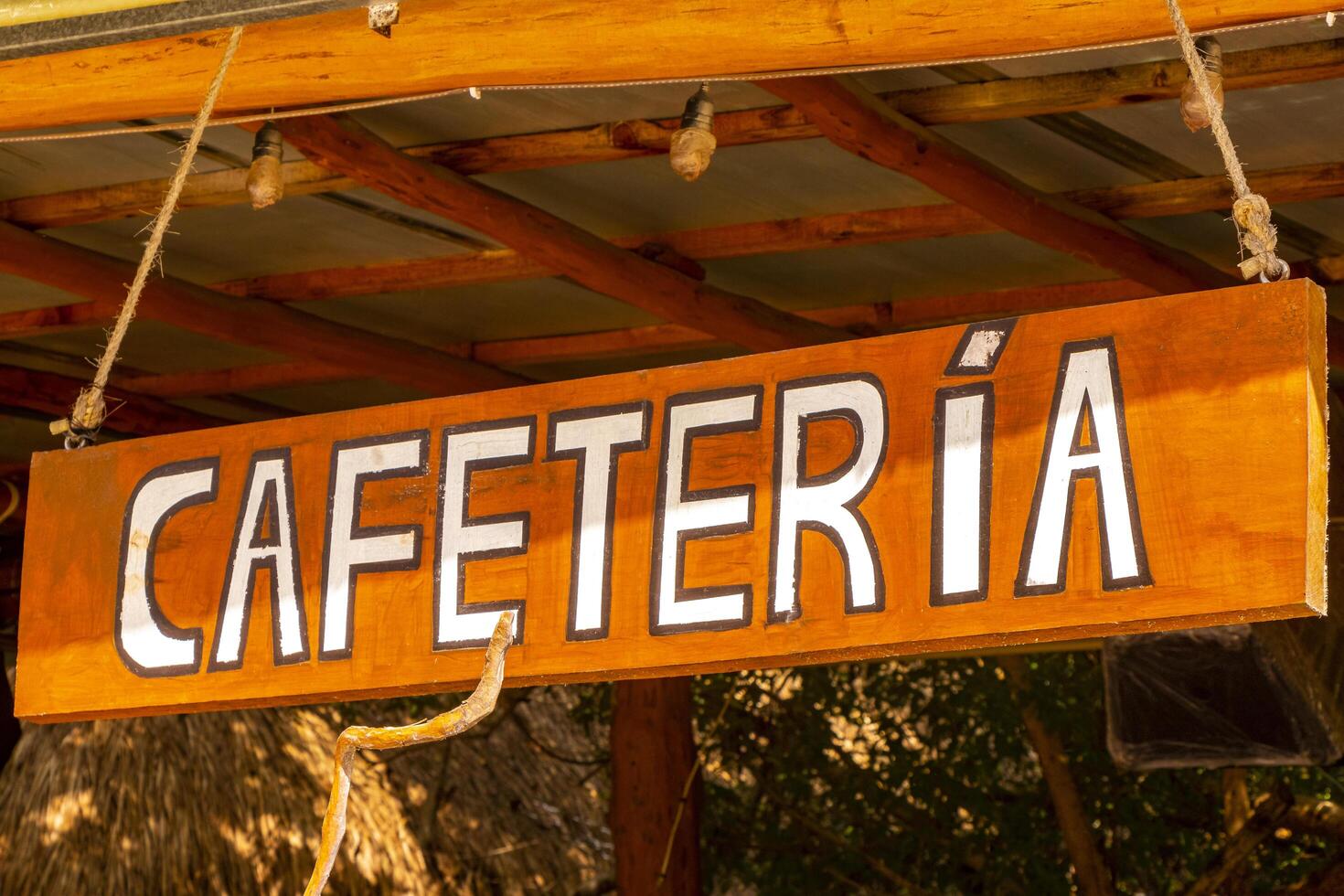 Playa del Carmen Quintana Roo Mexico 2023 Wooden sign at the entrance to the cafeteria in Mexico. photo