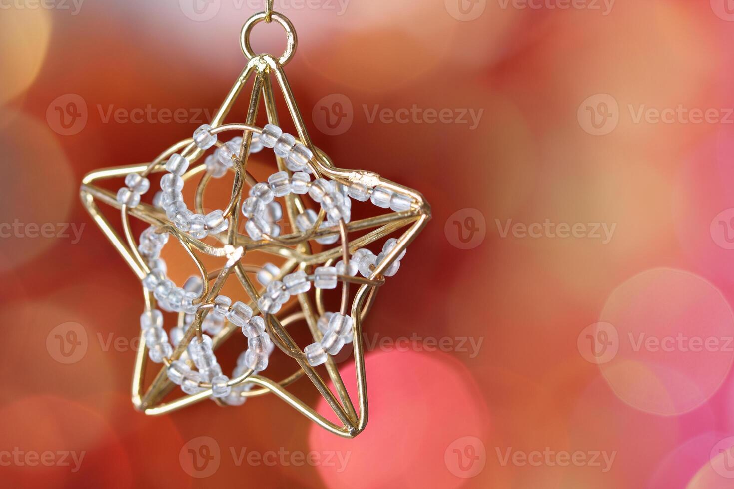 Little star decoration against blurred background photo