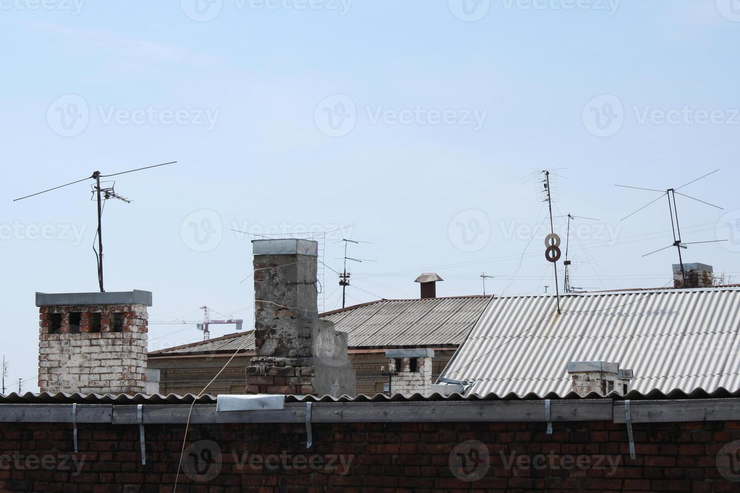 a view of a building with a lot of antennas on it photo
