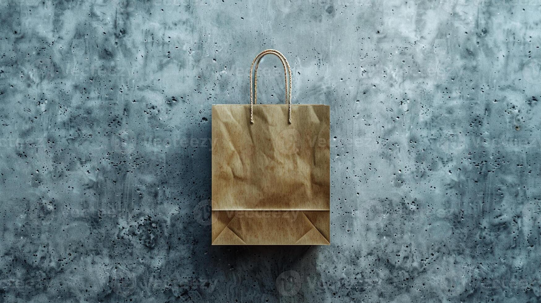 Brown paper bag mockup with rope handles on industrial concrete surface. Flat lay reusable paperbag template advertising image. Eco-friendly packaging mock up product photorealistic photo
