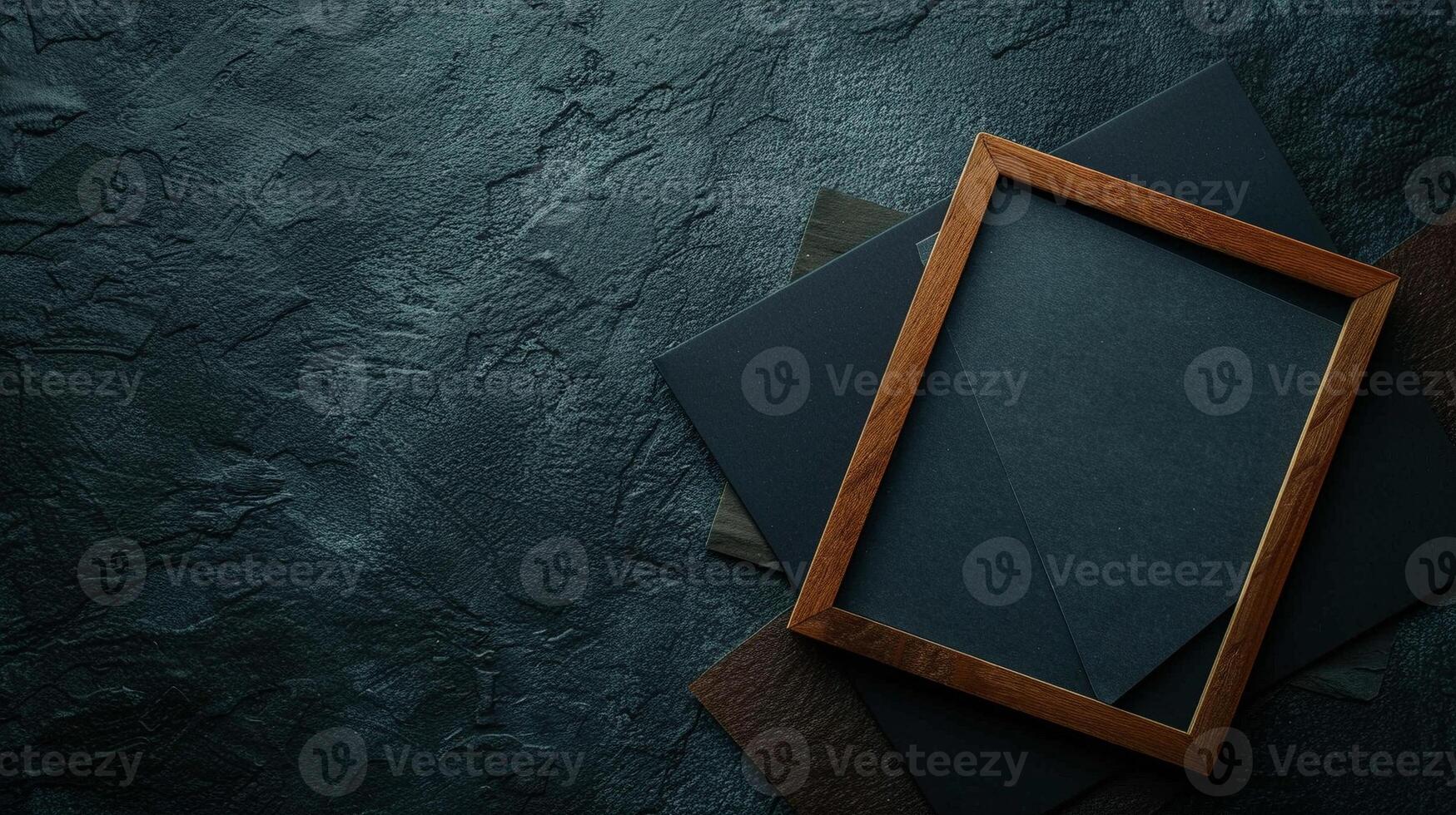 Wooden frame mockup on dark overlapping papers with textured background. Dimly lit photoframe template advertising image. Contemporary design pictureframe mock up product photorealistic photo