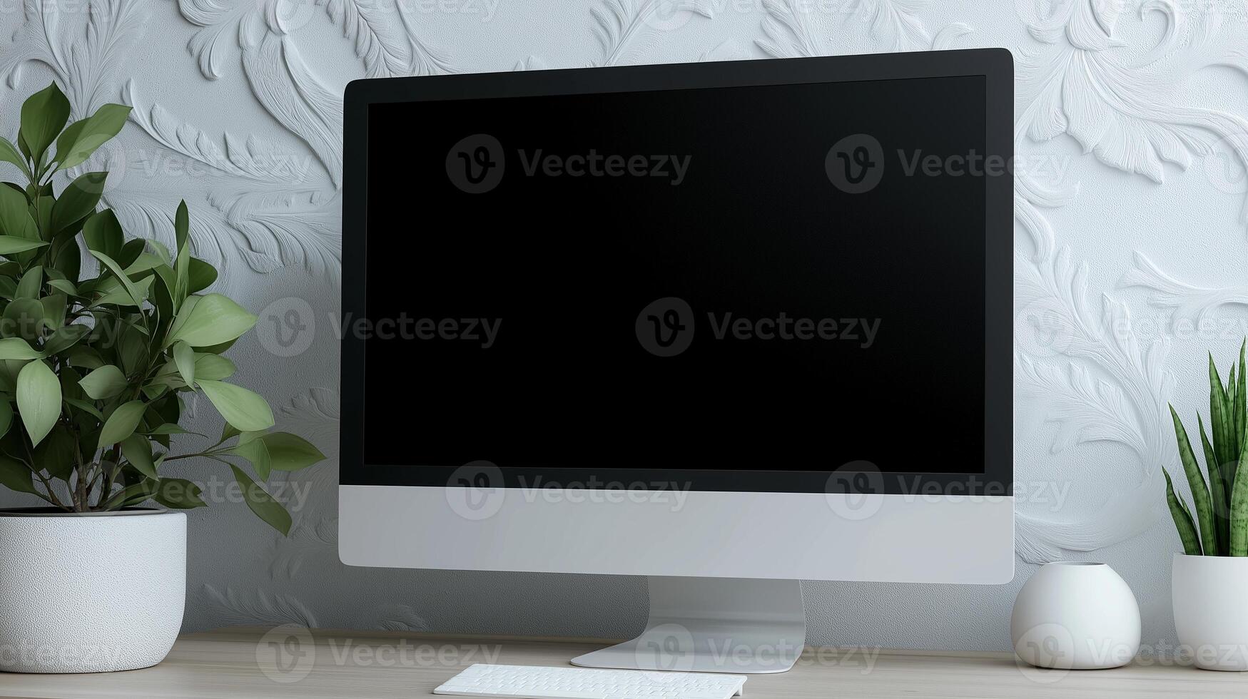 Computer monitor mockup near wall with floral patterns. Office workplace arrangement with pc template advertising image. Device screen mock up on table product photorealistic photo