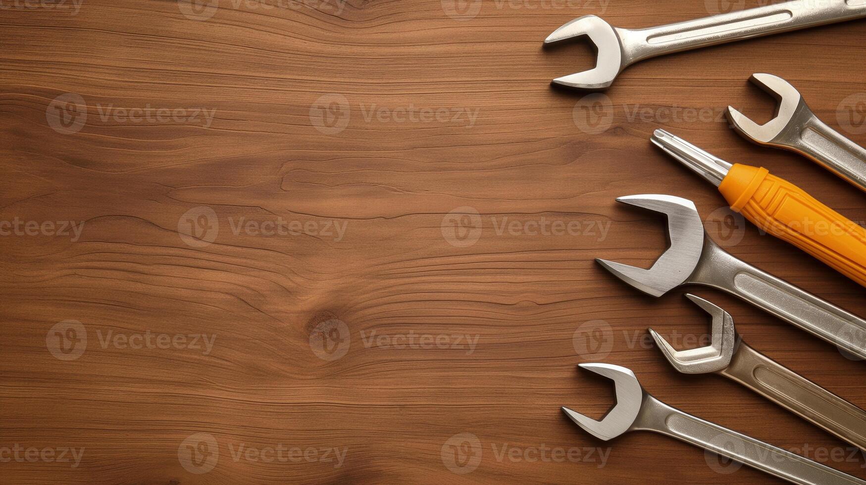 Metal spanners border on wooden table banner background copy space. Worker instruments kit image backdrop empty. Manual work supplies concept composition top view, copyspace photo
