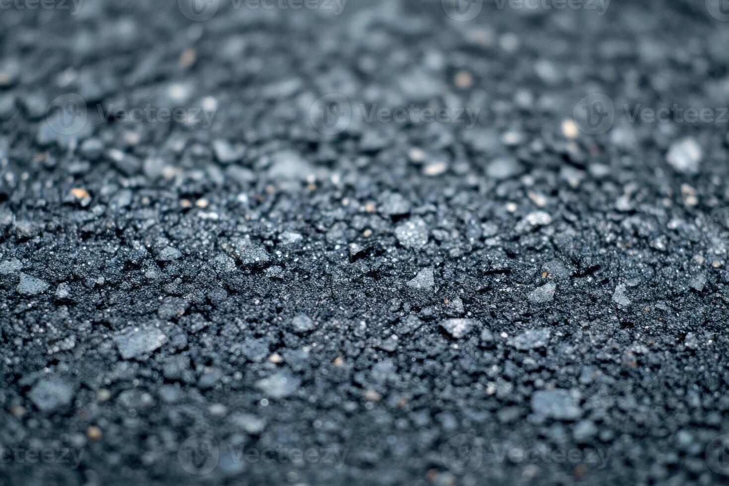 Close-up view of freshly laid asphalt showing texture and detail on a road surface photo