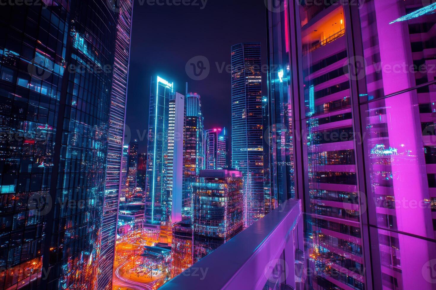Vibrant city skyline illuminated with neon lights at night from a high-rise building balcony photo