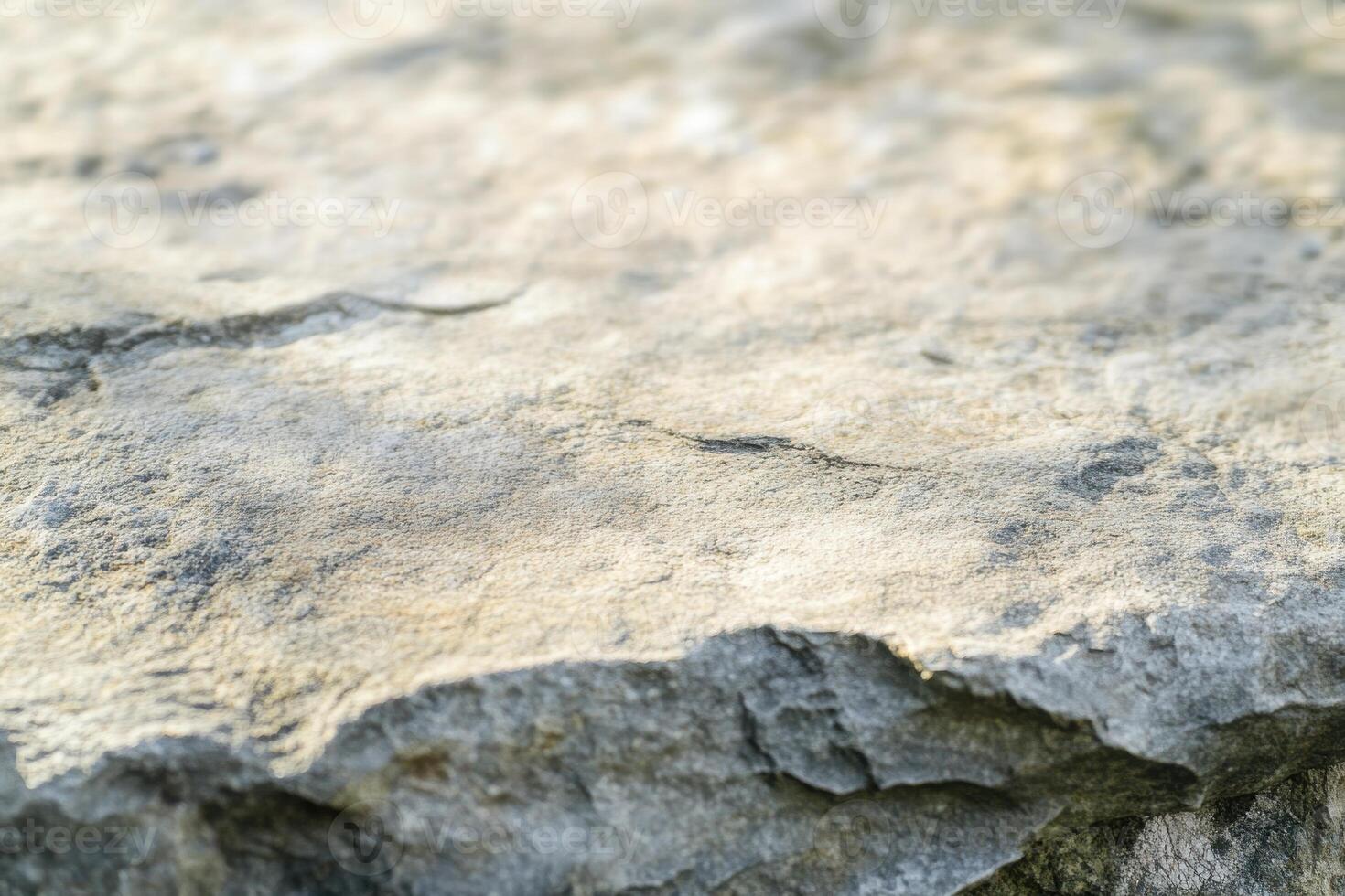 Natural stone surface close-up revealing texture and geological features in natural light photo