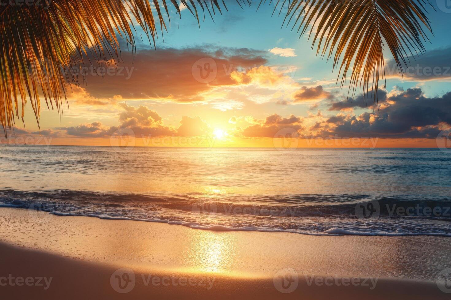 Vibrant sunset over calm ocean waves surrounded by palm trees on a tranquil beach photo