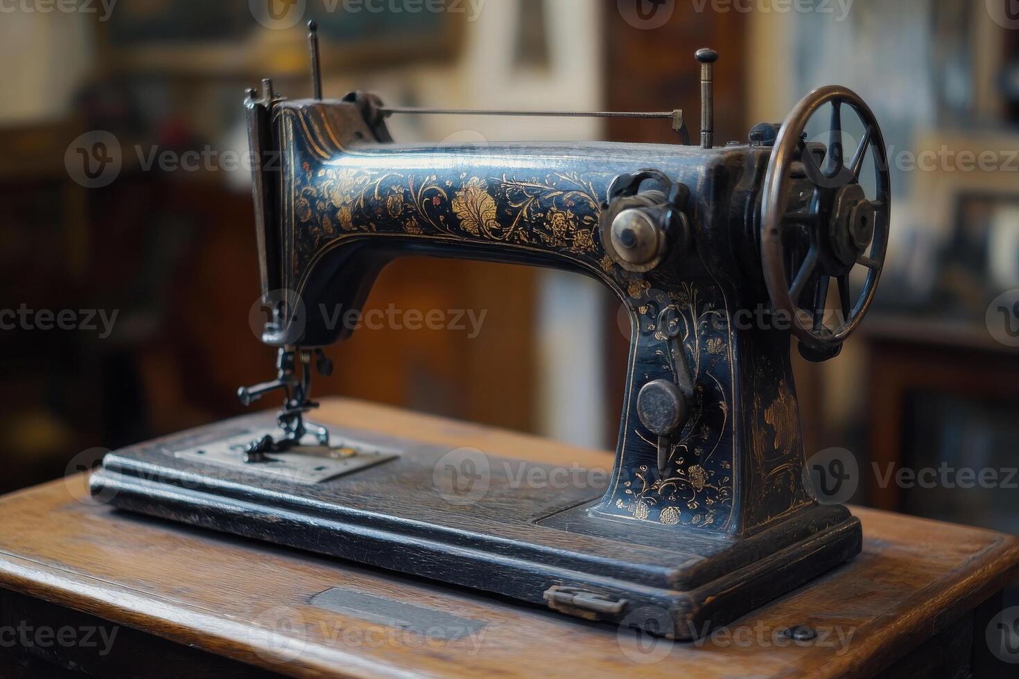 Antique sewing machine with intricate designs displayed on a wooden table in a vintage shop setting photo