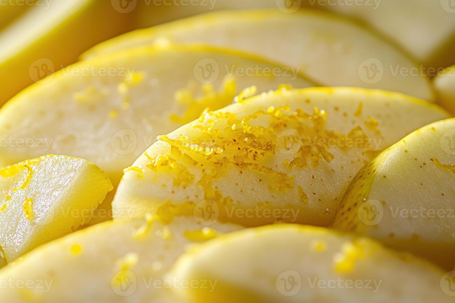 Fresh apple slices with lemon zest brighten a summer kitchen fruit display photo