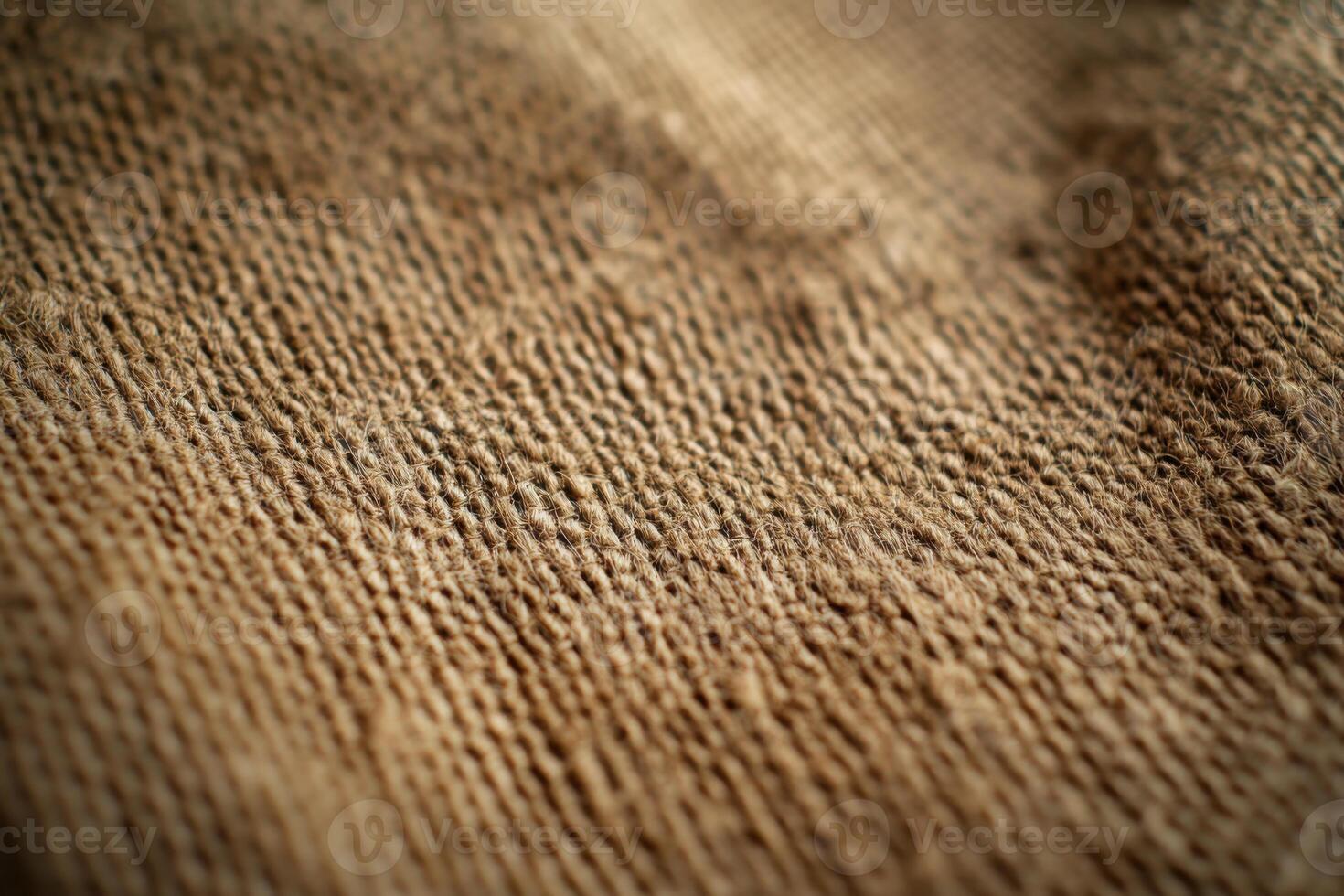 Close-up view of textured burlap fabric showcasing its natural fibers and weave detail photo
