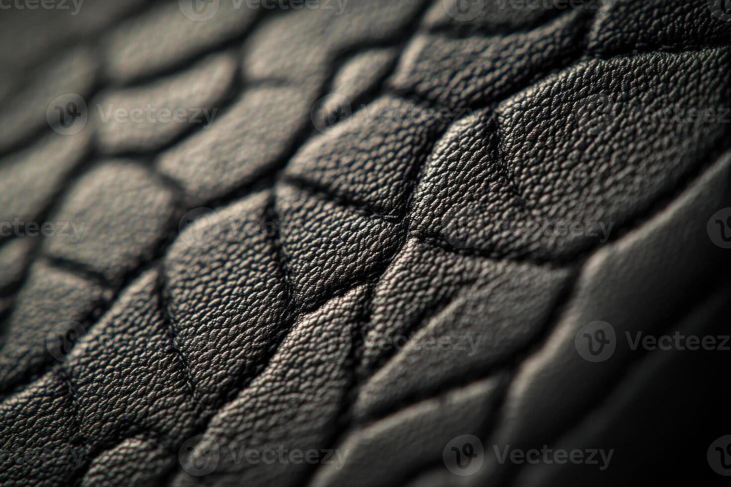 Close-up of textured black material showcasing intricate patterns and details photo