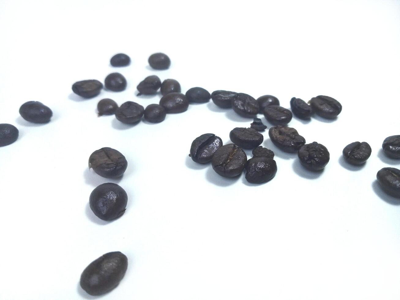 Roasted coffee bean isolated on white background with copy space photo