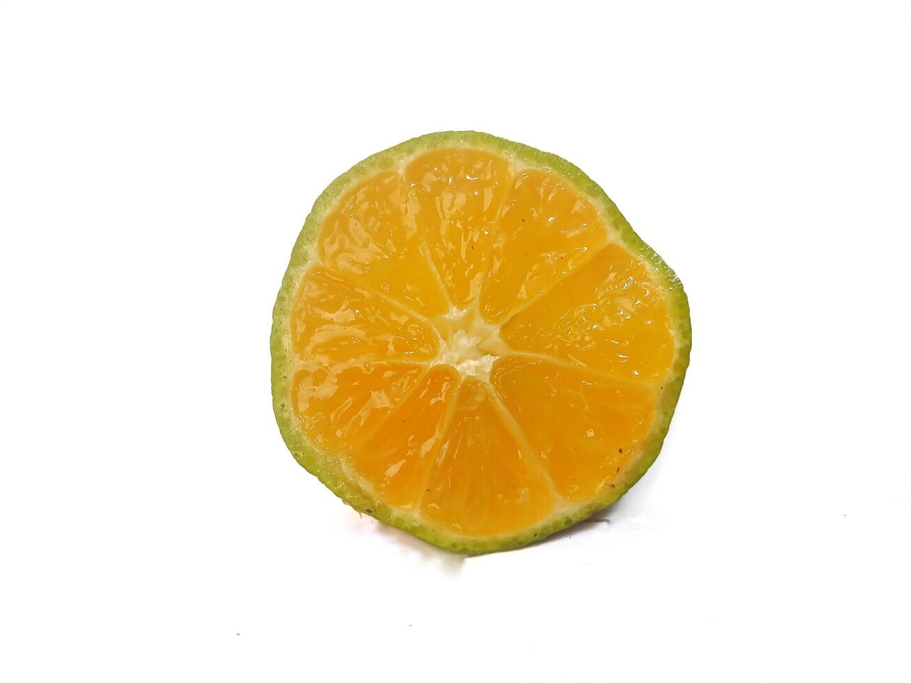 Lemon isolated. Round slice of ripe lemon on a white background. Fresh fruits with copy space photo