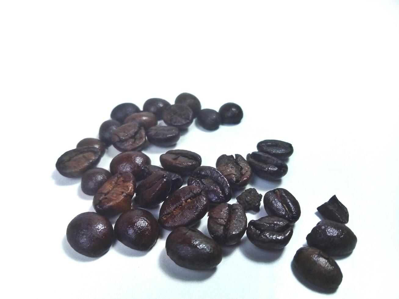 Roasted coffee bean isolated on white background with copy space photo