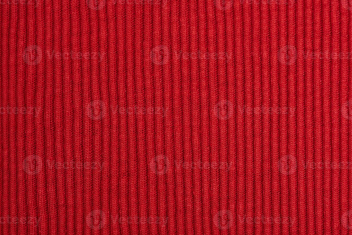 Red fabric as texture macro photo