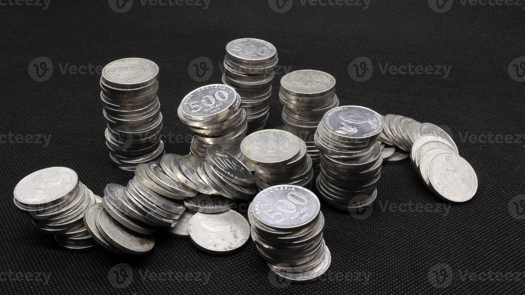 Stack of Indonesian coins isolated photo
