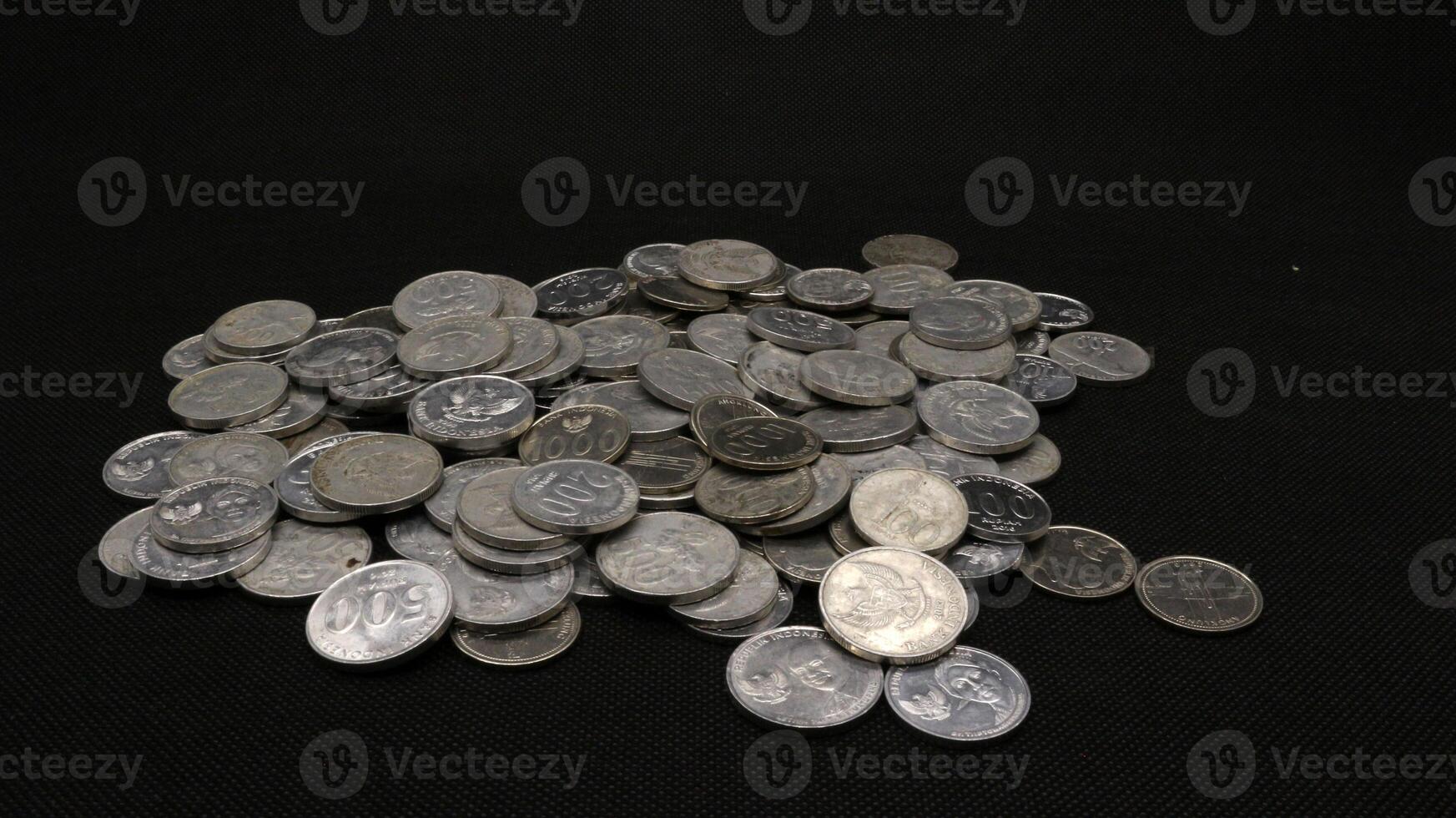 Stack of Indonesian coins isolated photo