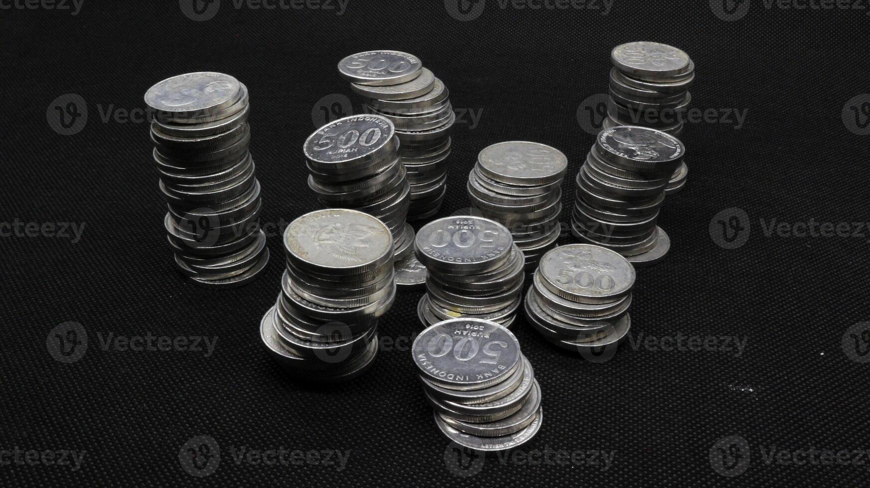 Stack of Indonesian coins isolated photo